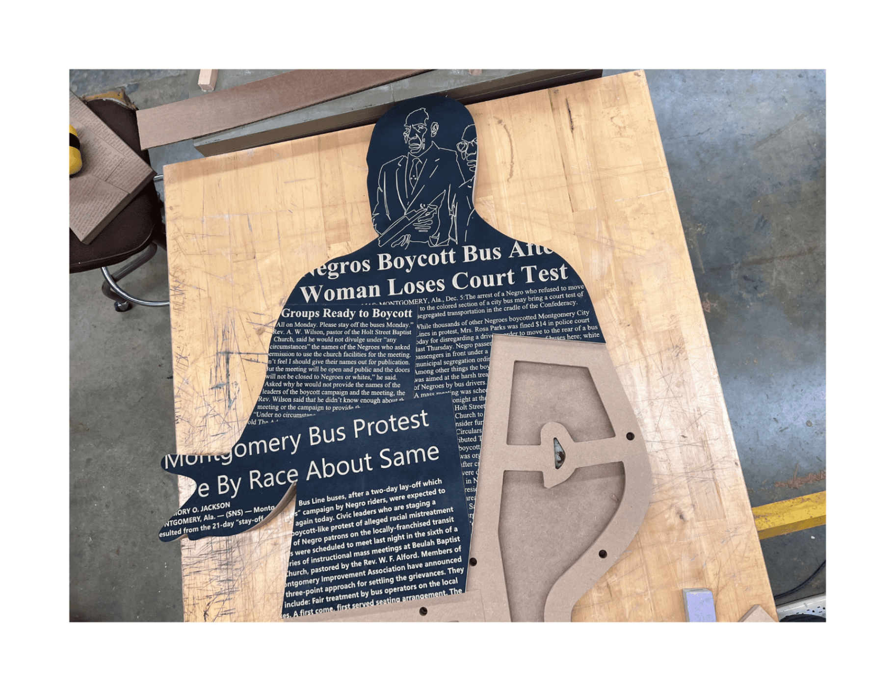 Two-photo installation view shows the figure permanently placed on its pedestal at the front of the church interior, with visitors and architects engaging the piece during the opening event.
