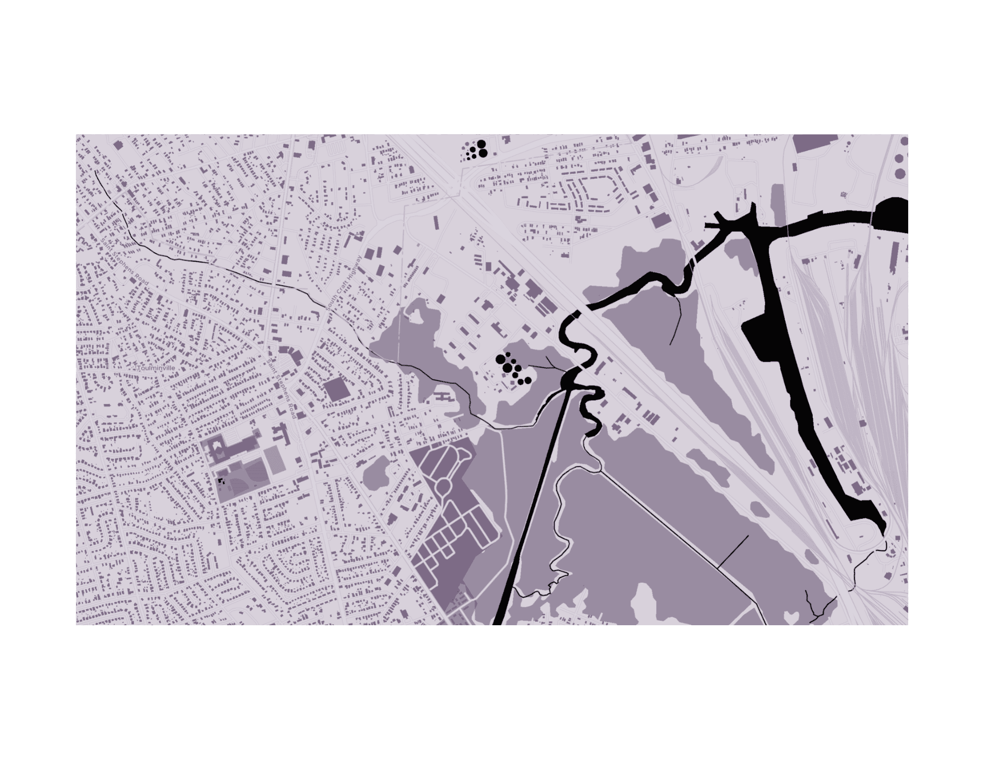 Close-range site map isolates Toulmin's Spring Branch, tracing waterway edges, road networks, and forested patches adjacent to the project site.